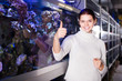 © JackF - Girl is delighted with the huge aquarium