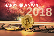 Happy New Year 2018 With Fireworks Background. Celebration New Year 2018. Close Up Golden Bitcoin Coin Crypto Currency Background Concept.