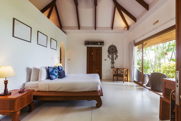 Modern bed room interior in Luxury villa. White colours, big window