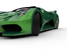 Green Racing Concept Car. Image Of A Car On A White Background. 3d Rendering.
