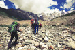 © lkoimages - Hiking in beautiful mountains. Group of hikers enjoy the weather
