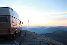 Old Camper Van With Scenic Mountains Morning View 