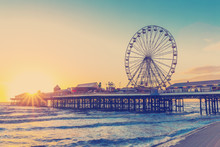 RETRO PHOTO FILTER EFFECT: Blackpool Central Pier At Sunset With Ferris Wheel, Lancashire, England UK