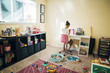 © Inti St. Clair - Girl working at desk in messy room