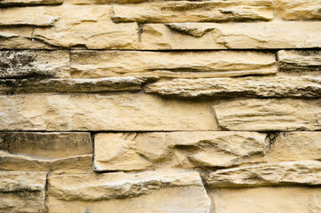 Poster - Background of yellow brick stone wall