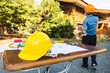 © Phushutter - A desk of engineers who are studying the area for laying foundation of energy saving homes