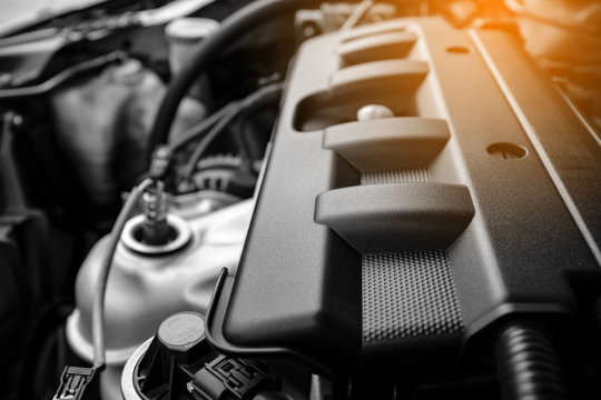 details of car engine with sunlight effect, black and white photography