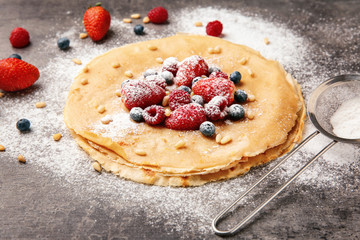 Sticker - Tasty buckwheat thin pancakes on table