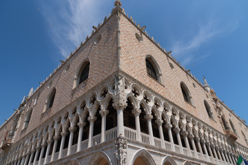 Wall Mural - Part of the facade of Doge's Palace (Palazzo Ducale) in Venice during the day show the detailed gothic style architecture