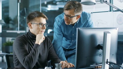 Aufkleber - Experienced Senior Engineer Consults Young Designer about Project, They Have Discussion and Work on a Personal Computer. Shot on RED EPIC-W 8K Helium Cinema Camera.