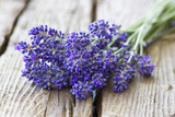 Fototapeta Lawenda - Bunch of lavender flowers on old wooden background