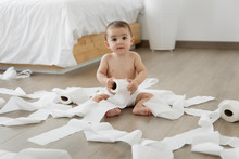 Cute Baby Making Mess With Toilet Paper