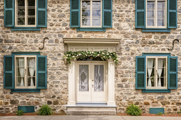 Front of old historic building entrance. Sunny summer day.