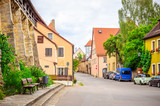 Fototapeta Uliczki - Beautiful streets in Rothenburg ob der Tauber with traditional German houses, Bavaria, Germany