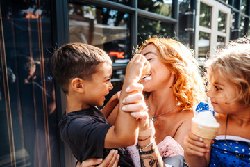 beautiful young family with ice cream