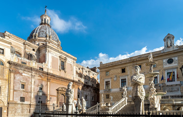 Wall Mural - View of Santa Caterina church dome with statue of the Pretoria fountain ahead in Palermo, Sicily, Italy