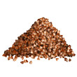 Buckwheat groats pile side view on white background