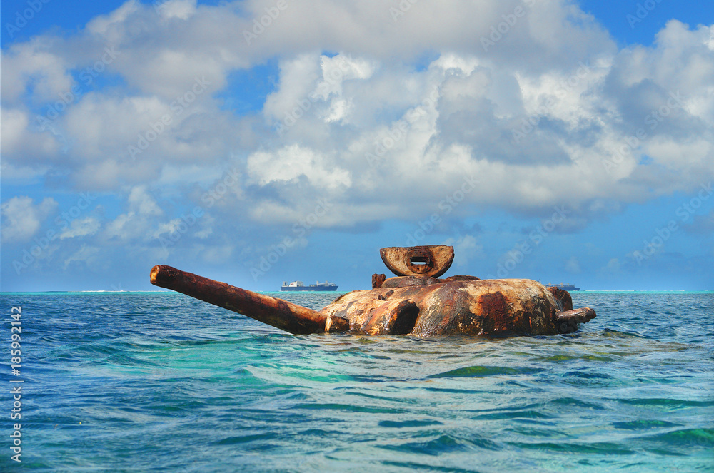 The submerged Sherman tank  of World War II, fought on the island of Saipan 
 - obrazy, fototapety, plakaty 