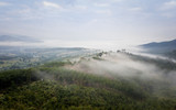 Fototapeta Miasto - Mountain and morning mist from drone