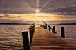 © Thomas - sun rays over the lake