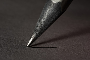 Graphite pencil makes a strip of macro, soft focus