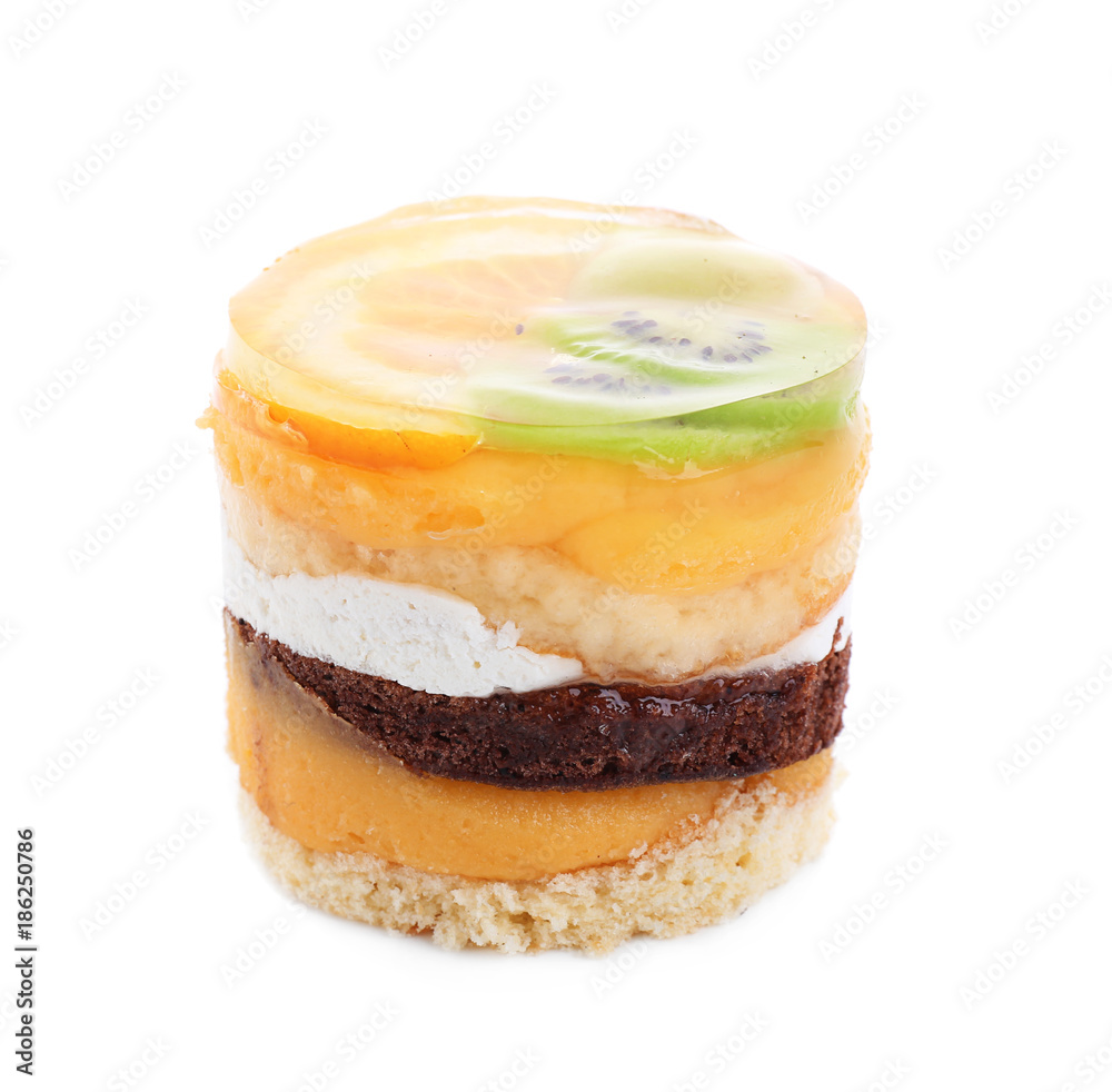 Tasty sponge cake with jelly fruits on white background