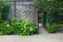 Secret Garden Doorway Through Stone Wall