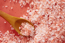 Pink Himalayan Salt In Spoon. Top View Of Spoon Full Of Pink Himalayan Salt On Salt Crystal.