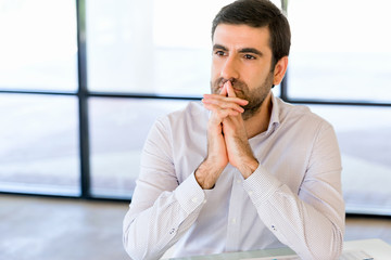 Poster - Pensive businessman at office