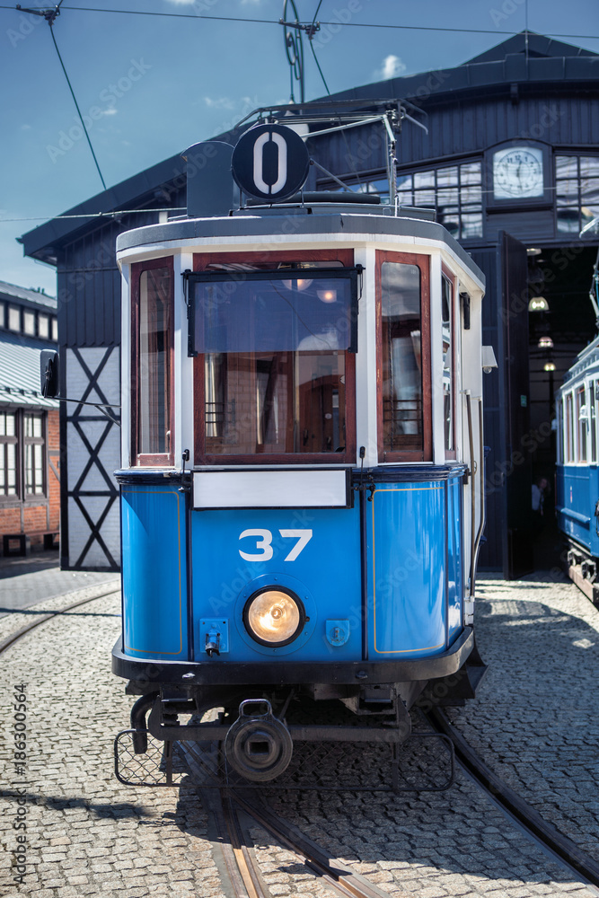 old vintage blue tram - obrazy, fototapety, plakaty 