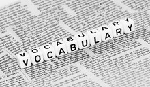 Vocabulary Alphabet Cubes On Newspaper