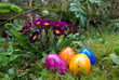 colored easter eggs in the garden