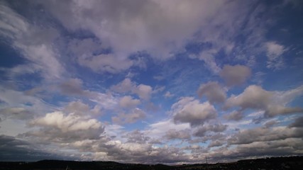 Wall Mural - time lapse of clouds at sunset, clouds in the sky timelapse