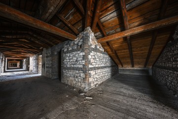 Wall Mural - Creepy attic interior at abandoned building