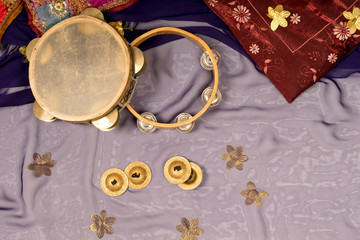 musical instruments of a bellydance percussiongroup with darbuka's, tambourines and zills