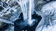 Aerial photo of the Seljalandsfoss waterfall in winter