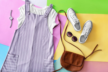 Sticker - Composition with female wardrobe on color background