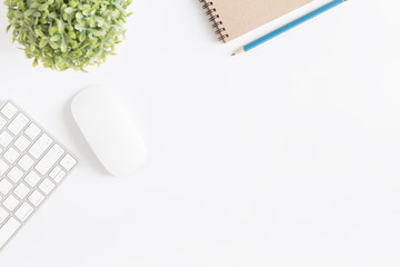Wall Mural - flat lay photo of office desk with mouse and keyboard,copy space on white background with notebook a