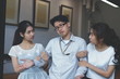 © tuaindeed - Vintage toned image of complicated stressed relationship between three people. Love triangle concept.