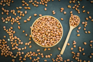 Wall Mural - Peanuts in wooden bowl