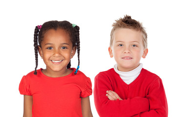 Canvas Print - Two funny children in red looking at camera