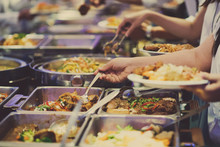 Scooping The Food. Buffet Food At Restaurant. Catering Food