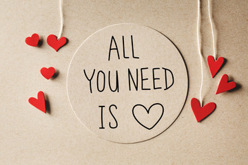 Wall Mural - All You Need Is Love message with handmade small paper hearts