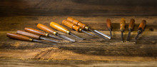Set Of Wood Chisel For Carving Wood, Sculpture Tools On Wooden Background