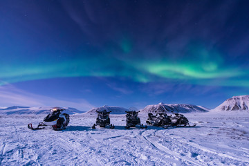 Wall Mural - the polar arctic northern lights aurora borealis sky star in norway svalbard in longyearbyen city sn