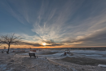 Wall Mural - Sunset at a Very Cold Beach on Lake Michigan 276