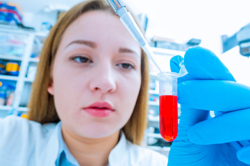 Poster - technician woman works with in genetic lab with biological materials