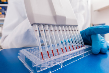 Poster - technician woman works with in genetic lab with biological materials