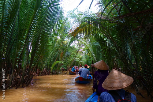 Fotografía My Tho, Vietnam: Tourist at Mekong River Delta jungle cruise with unidentified c
