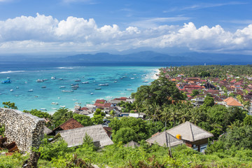 main town of nusa lembongan island, bali, indonesia, with boats awaiting to go to mainland bali